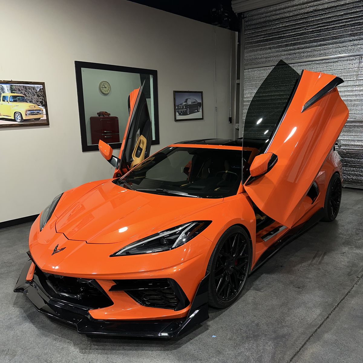 Chevrolet Corvette Z06 with doors up in the Best Auto Care Visalia shop